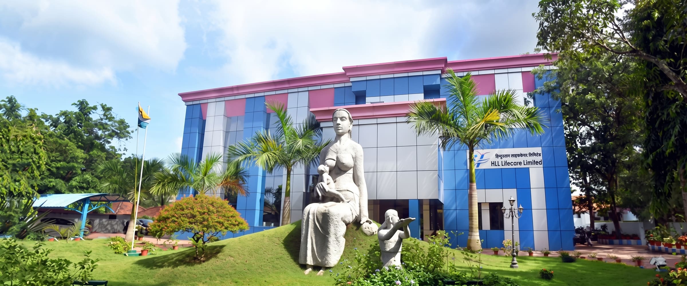 The HLL Lifecare Limited campus, with the mother-and-child sculpture on the lawn in front of the main building